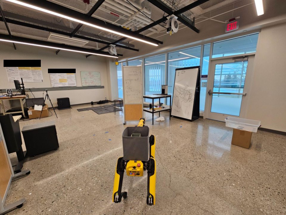 A Spot robot in the HELIOS hardware experiment scene